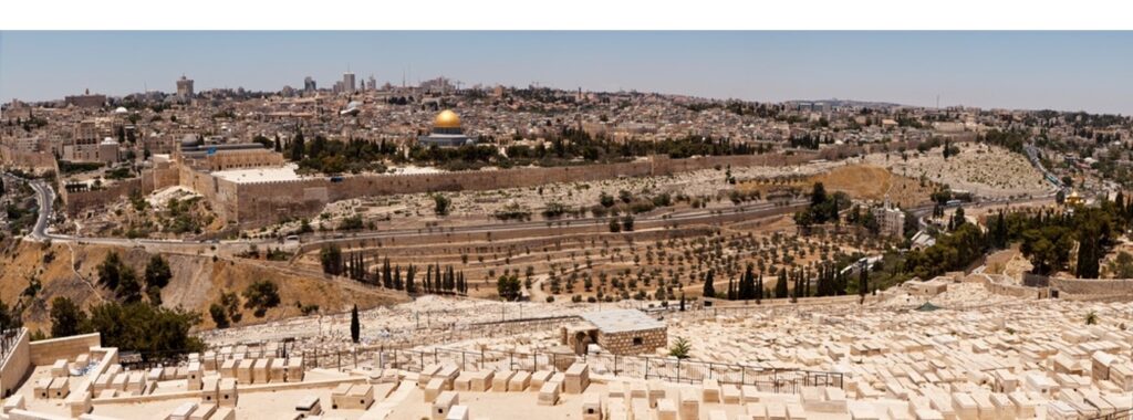 The old city of Jerusalem with the golden dome of the Al-Aqsa Mosque on a sunny day in Palestine.
